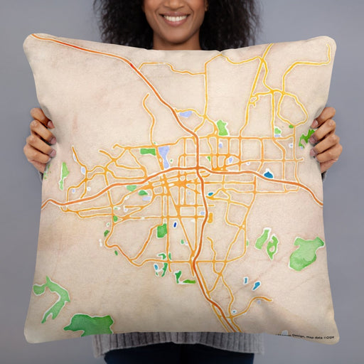 Person holding 22x22 Custom Reno Nevada Map Throw Pillow in Watercolor