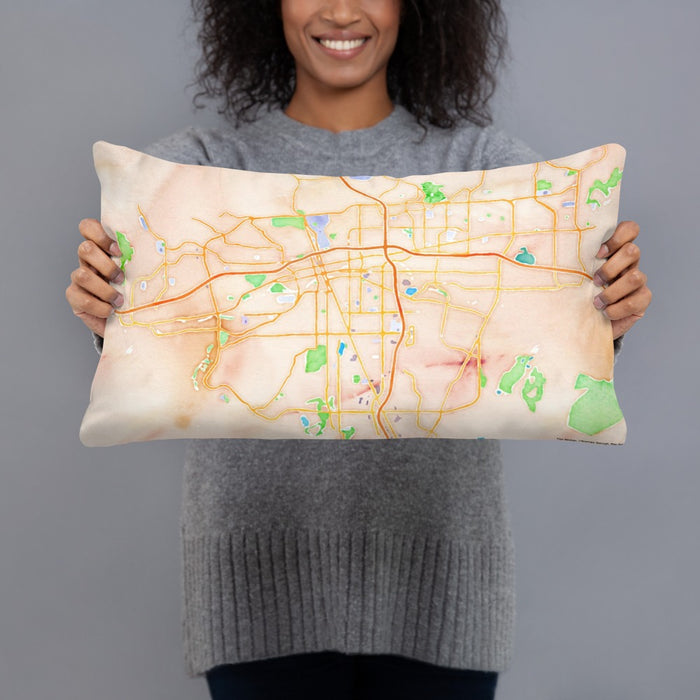 Person holding 20x12 Custom Reno Nevada Map Throw Pillow in Watercolor