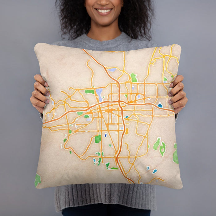 Person holding 18x18 Custom Reno Nevada Map Throw Pillow in Watercolor