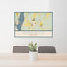 24x36 Rhinebeck New York Map Print Landscape Orientation in Woodblock Style Behind 2 Chairs Table and Potted Plant