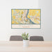 24x36 Richland Washington Map Print Lanscape Orientation in Woodblock Style Behind 2 Chairs Table and Potted Plant