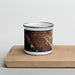 Front View Custom Richmond California Map Enamel Mug in Ember on Cutting Board