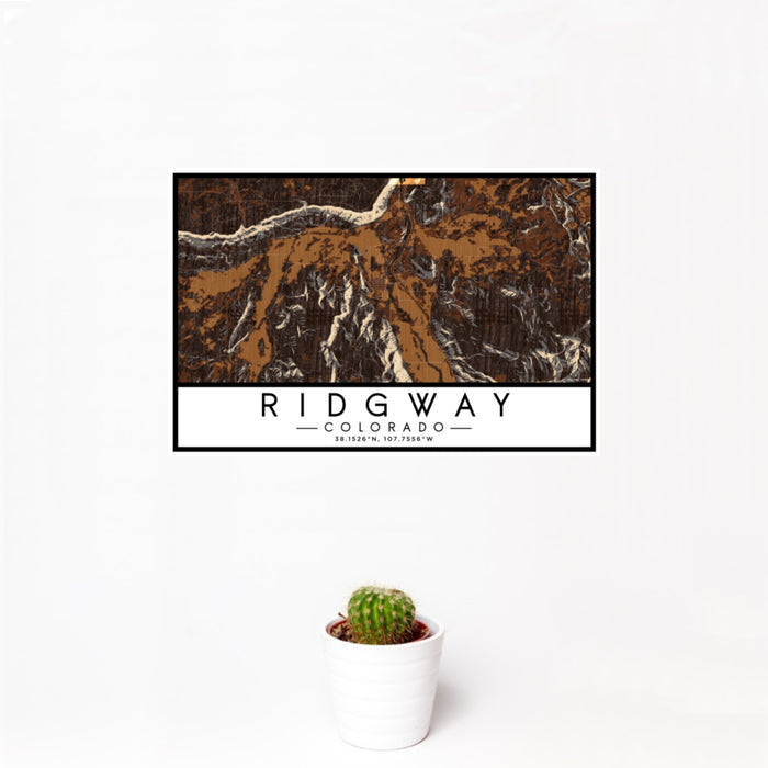 12x18 Ridgway Colorado Map Print Landscape Orientation in Ember Style With Small Cactus Plant in White Planter