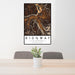 24x36 Ridgway Colorado Map Print Portrait Orientation in Ember Style Behind 2 Chairs Table and Potted Plant