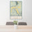 24x36 Ridgway Colorado Map Print Portrait Orientation in Woodblock Style Behind 2 Chairs Table and Potted Plant