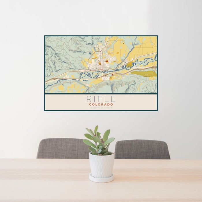 24x36 Rifle Colorado Map Print Lanscape Orientation in Woodblock Style Behind 2 Chairs Table and Potted Plant