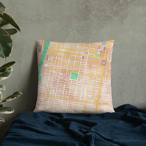 Custom Rittenhouse Square Pennsylvania Map Throw Pillow in Watercolor on Bedding Against Wall