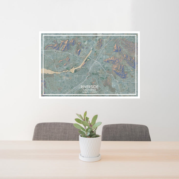 24x36 Riverside California Map Print Lanscape Orientation in Afternoon Style Behind 2 Chairs Table and Potted Plant