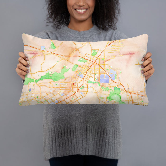 Person holding 20x12 Custom Riverside California Map Throw Pillow in Watercolor