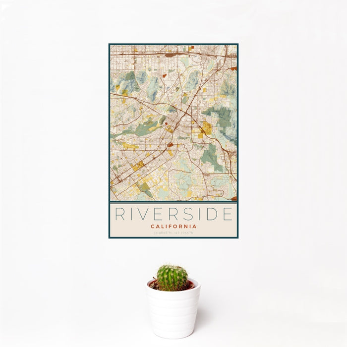 12x18 Riverside California Map Print Portrait Orientation in Woodblock Style With Small Cactus Plant in White Planter