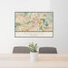 24x36 Riverside California Map Print Landscape Orientation in Woodblock Style Behind 2 Chairs Table and Potted Plant