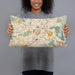 Person holding 20x12 Custom Riverside California Map Throw Pillow in Woodblock
