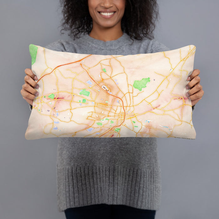 Person holding 20x12 Custom Roanoke Virginia Map Throw Pillow in Watercolor
