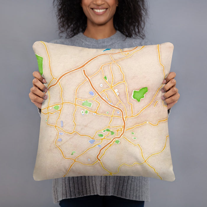 Person holding 18x18 Custom Roanoke Virginia Map Throw Pillow in Watercolor