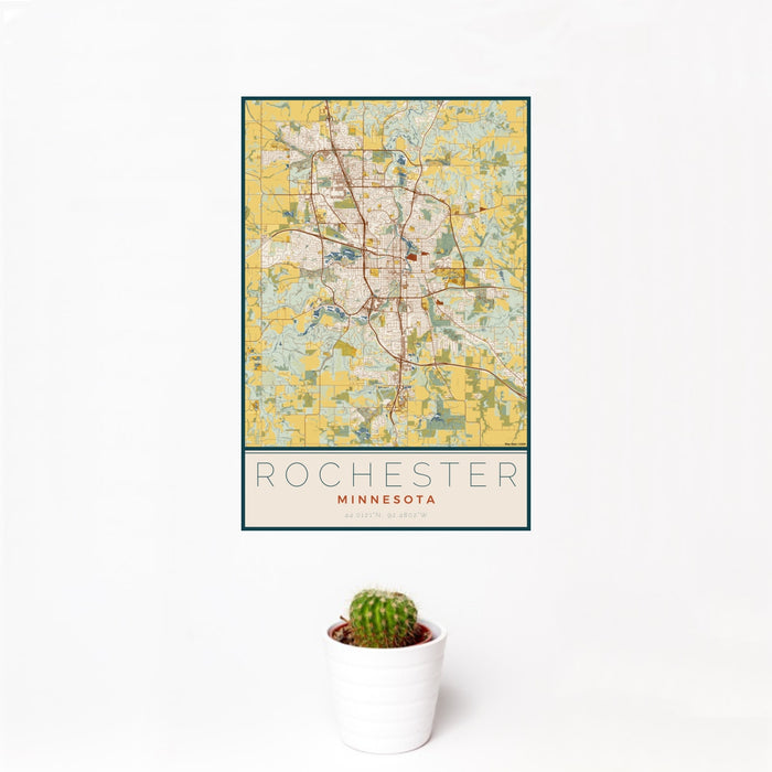 12x18 Rochester Minnesota Map Print Portrait Orientation in Woodblock Style With Small Cactus Plant in White Planter