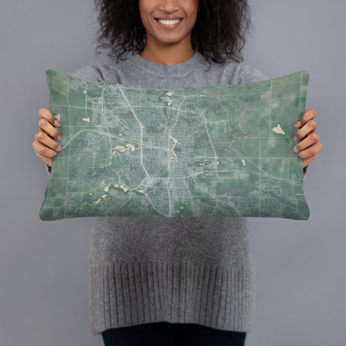 Person holding 20x12 Custom Rochester Minnesota Map Throw Pillow in Afternoon