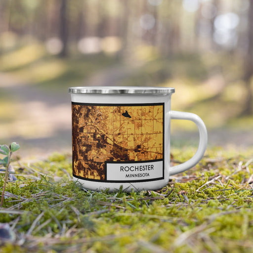 Right View Custom Rochester Minnesota Map Enamel Mug in Ember on Grass With Trees in Background