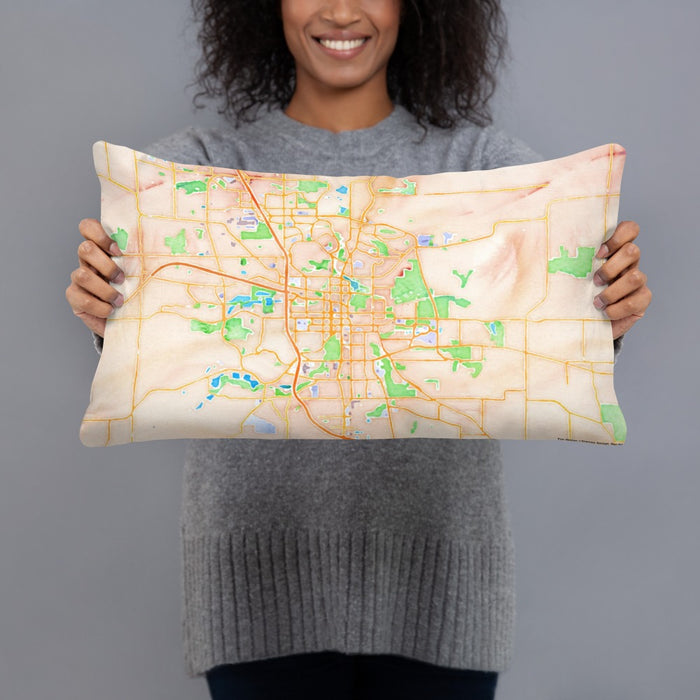 Person holding 20x12 Custom Rochester Minnesota Map Throw Pillow in Watercolor