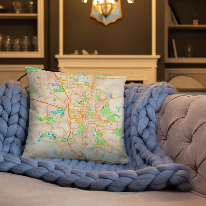 Custom Rochester Minnesota Map Throw Pillow in Watercolor on Cream Colored Couch