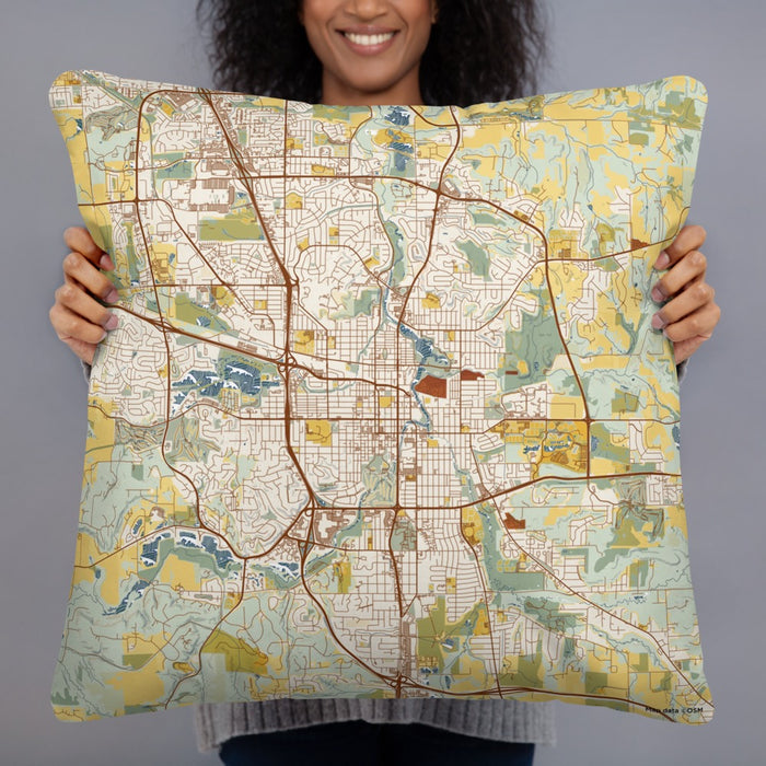 Person holding 22x22 Custom Rochester Minnesota Map Throw Pillow in Woodblock