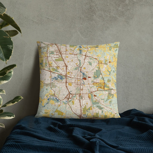 Custom Rochester Minnesota Map Throw Pillow in Woodblock on Bedding Against Wall