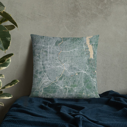Custom Rochester New York Map Throw Pillow in Afternoon on Bedding Against Wall