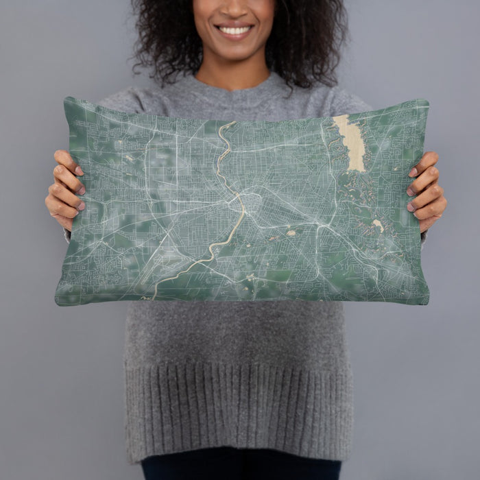 Person holding 20x12 Custom Rochester New York Map Throw Pillow in Afternoon