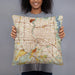 Person holding 18x18 Custom Rochester New York Map Throw Pillow in Woodblock