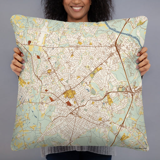 Person holding 22x22 Custom Rock Hill South Carolina Map Throw Pillow in Woodblock