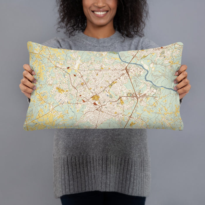 Person holding 20x12 Custom Rock Hill South Carolina Map Throw Pillow in Woodblock