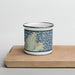 Front View Custom Rockport Massachusetts Map Enamel Mug in Woodblock on Cutting Board
