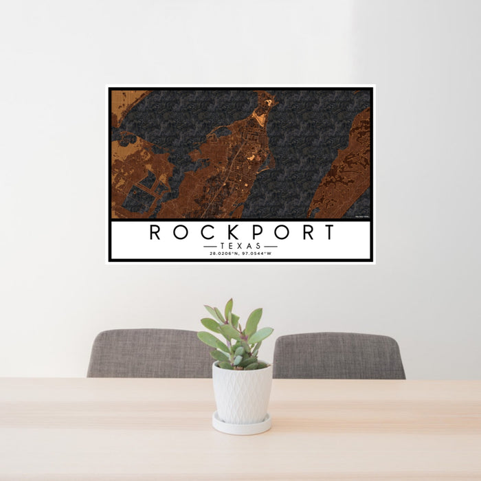 24x36 Rockport Texas Map Print Lanscape Orientation in Ember Style Behind 2 Chairs Table and Potted Plant