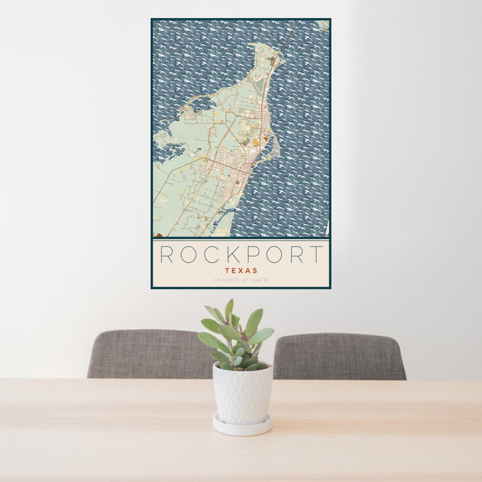 24x36 Rockport Texas Map Print Portrait Orientation in Woodblock Style Behind 2 Chairs Table and Potted Plant