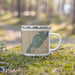 Right View Custom Rockport Texas Map Enamel Mug in Afternoon on Grass With Trees in Background