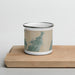 Front View Custom Rockport Texas Map Enamel Mug in Afternoon on Cutting Board