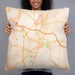 Person holding 22x22 Custom Rocky Mount North Carolina Map Throw Pillow in Watercolor
