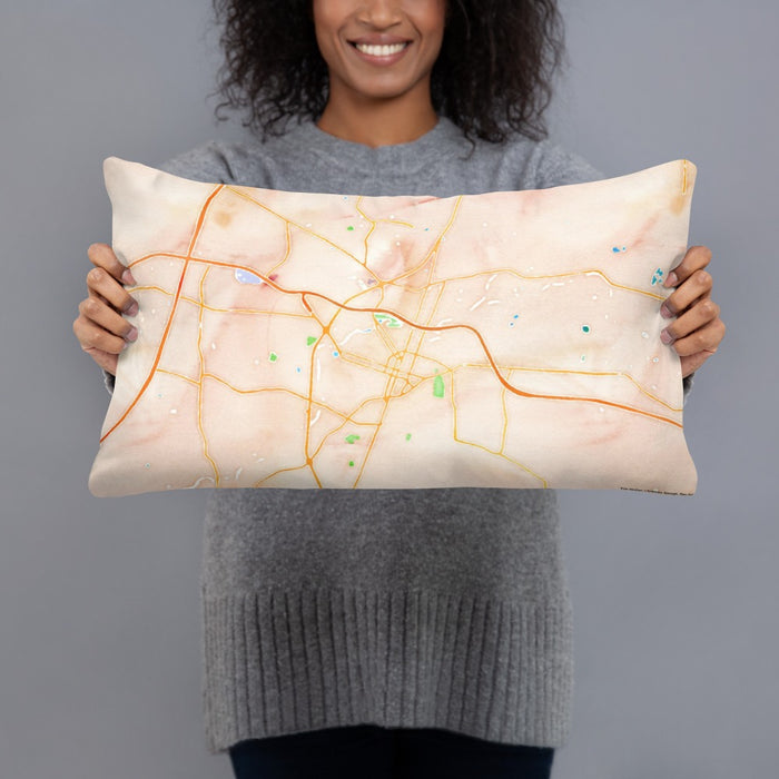 Person holding 20x12 Custom Rocky Mount North Carolina Map Throw Pillow in Watercolor