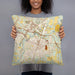 Person holding 18x18 Custom Rocky Mount North Carolina Map Throw Pillow in Woodblock