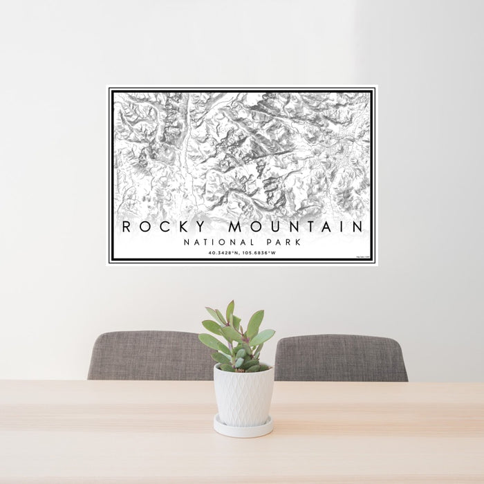 24x36 Rocky Mountain National Park Map Print Landscape Orientation in Classic Style Behind 2 Chairs Table and Potted Plant