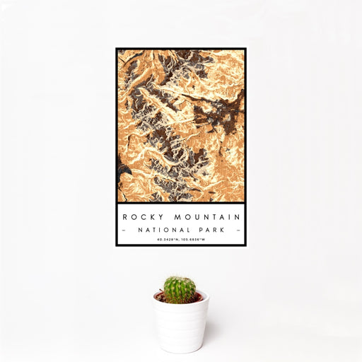 12x18 Rocky Mountain National Park Map Print Portrait Orientation in Ember Style With Small Cactus Plant in White Planter