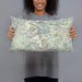Person holding 20x12 Custom Rocky Mountain National Park Map Throw Pillow in Woodblock