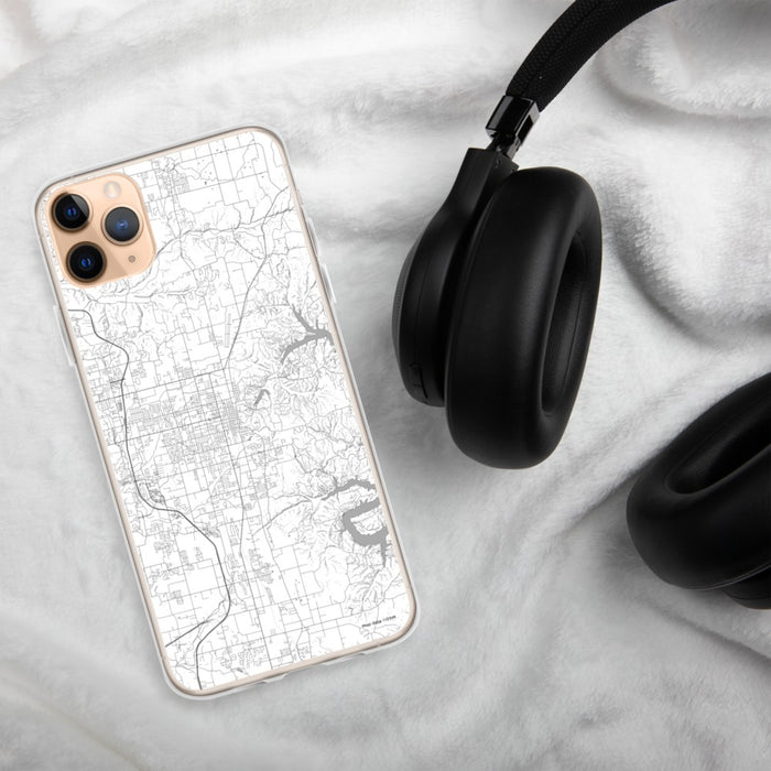Custom Rogers Arkansas Map Phone Case in Classic on Table with Black Headphones