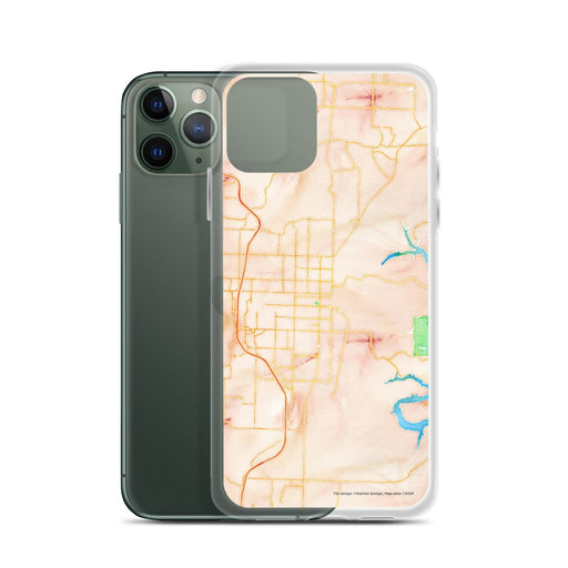 Custom Rogers Arkansas Map Phone Case in Watercolor on Table with Laptop and Plant