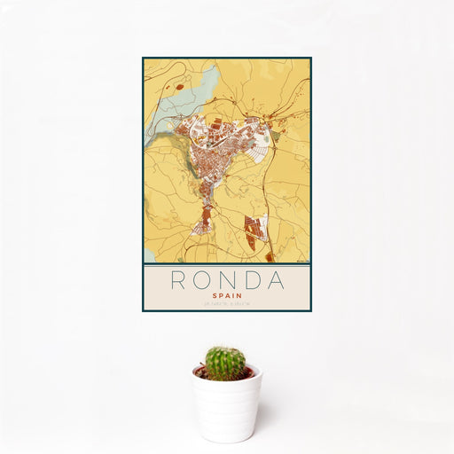 12x18 Ronda Spain Map Print Portrait Orientation in Woodblock Style With Small Cactus Plant in White Planter