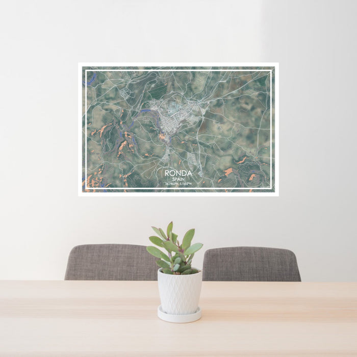 24x36 Ronda Spain Map Print Lanscape Orientation in Afternoon Style Behind 2 Chairs Table and Potted Plant