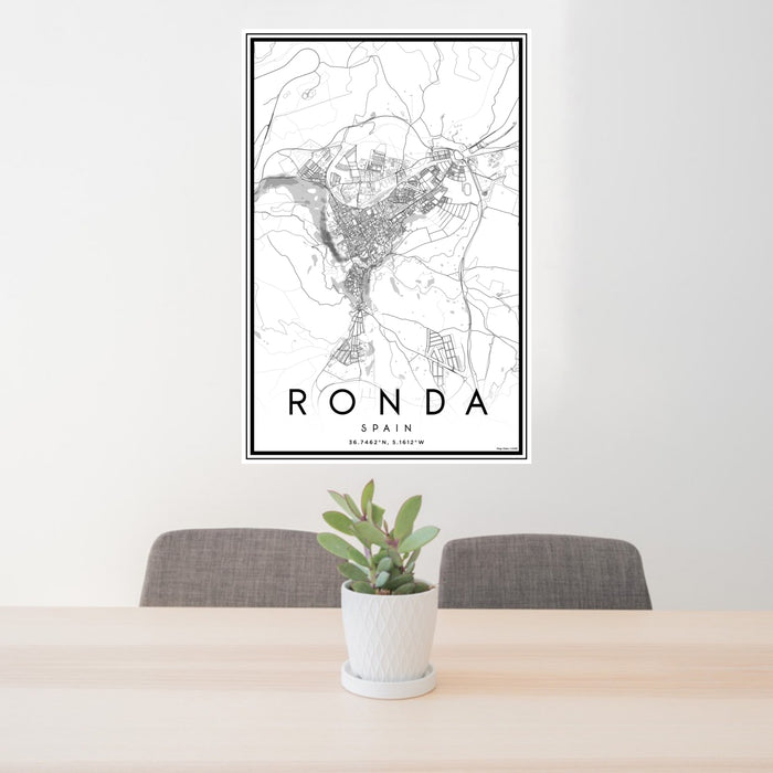 24x36 Ronda Spain Map Print Portrait Orientation in Classic Style Behind 2 Chairs Table and Potted Plant
