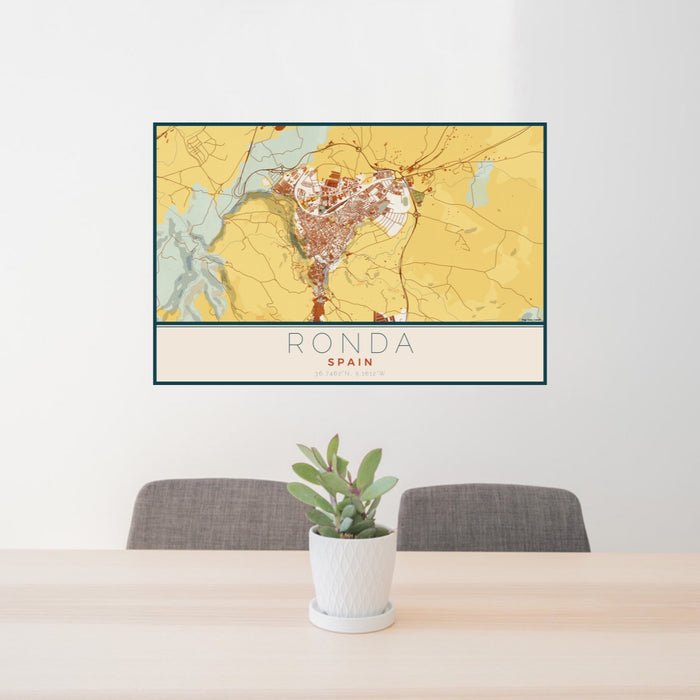 24x36 Ronda Spain Map Print Lanscape Orientation in Woodblock Style Behind 2 Chairs Table and Potted Plant