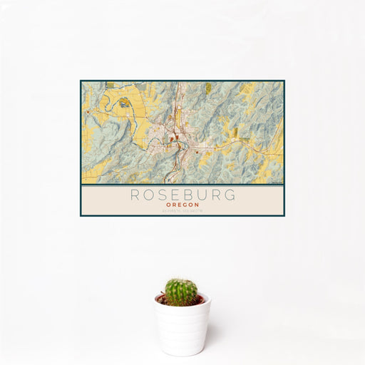 12x18 Roseburg Oregon Map Print Landscape Orientation in Woodblock Style With Small Cactus Plant in White Planter