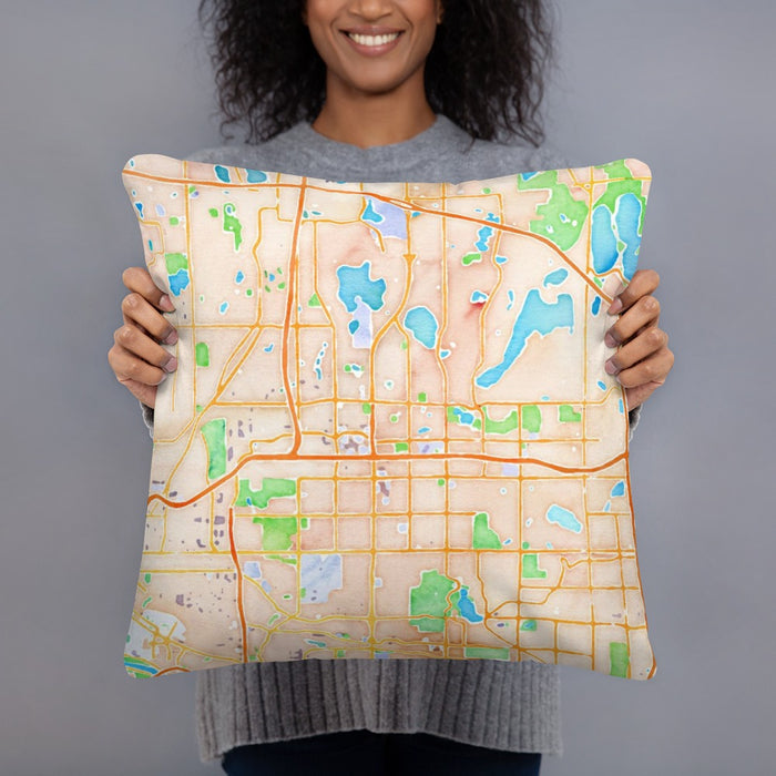 Person holding 18x18 Custom Roseville Minnesota Map Throw Pillow in Watercolor