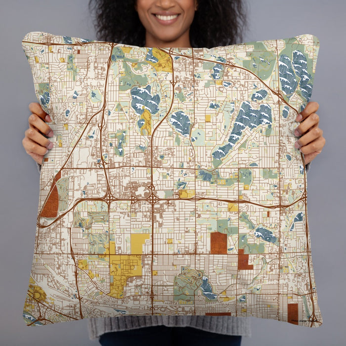 Person holding 22x22 Custom Roseville Minnesota Map Throw Pillow in Woodblock